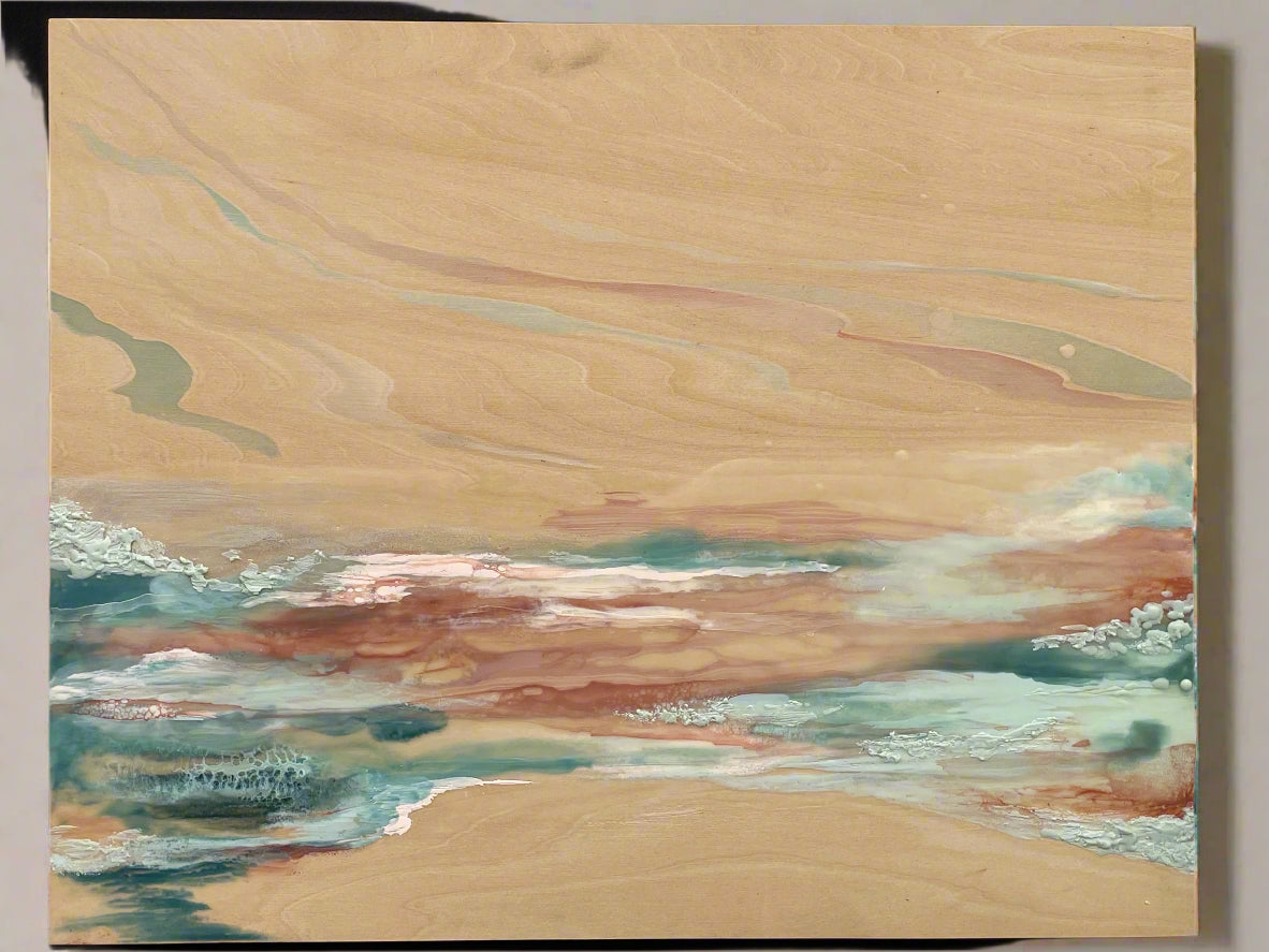 Abstract painting of a beach scene with beige, blue, and green colors on a wooden panel.