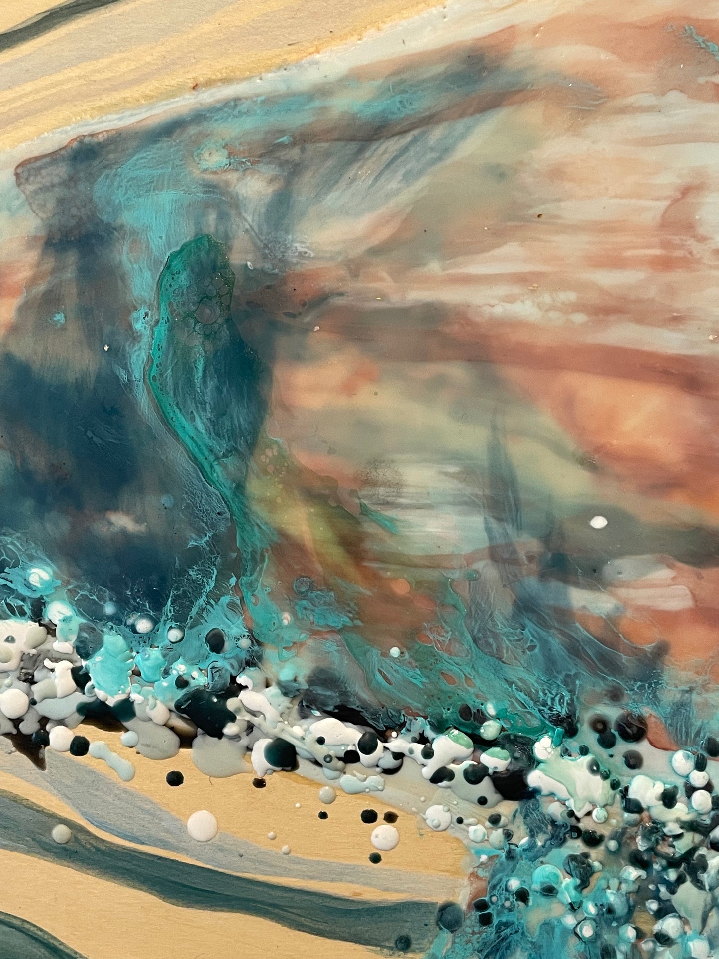 Abstract art with a mix of colors and textures on a beige background